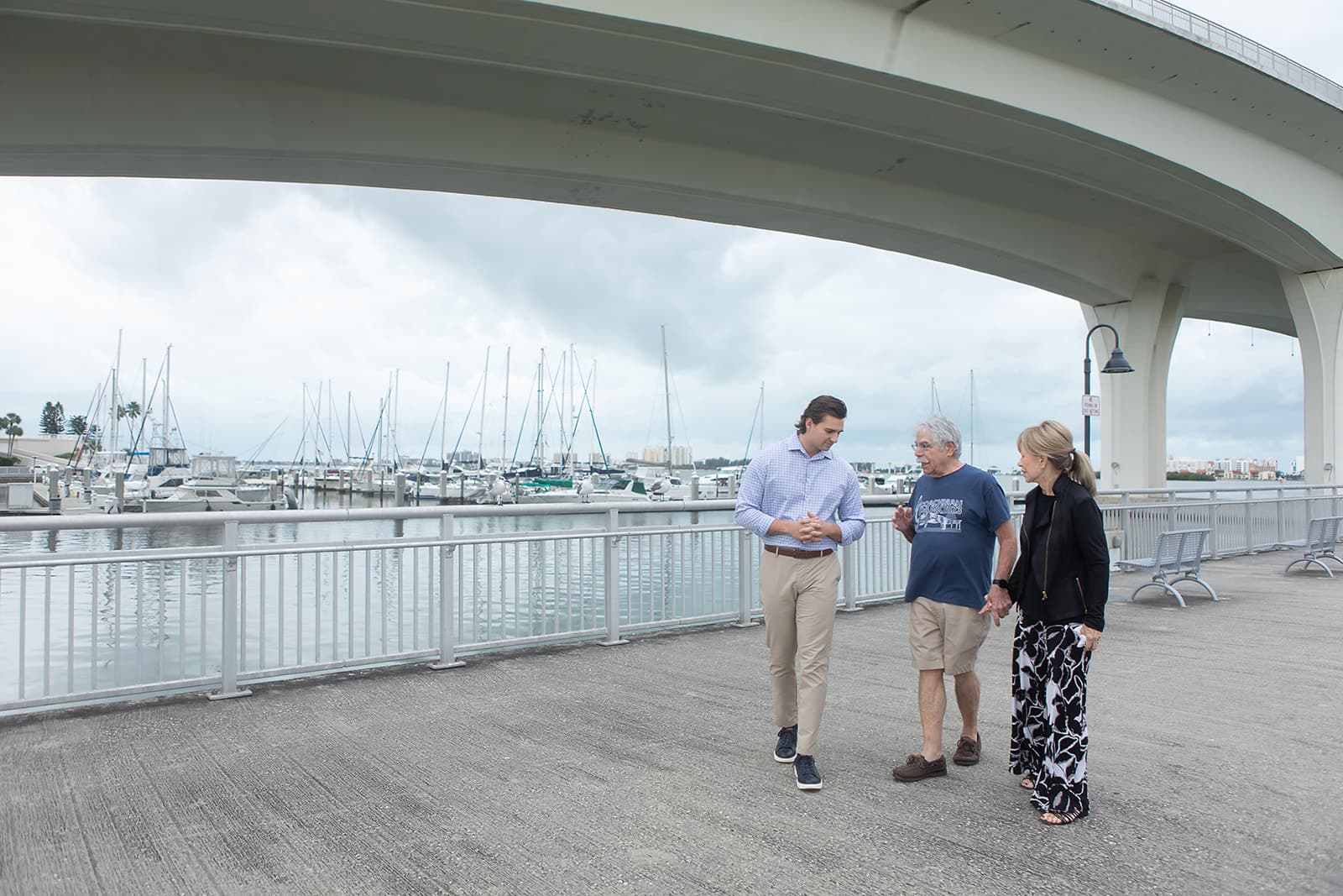 Sam Wilson walking with residents at the Clearwater marina